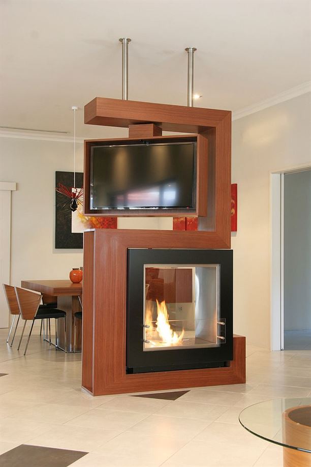 Awesome-room-divider-holds-turnable-TV-and-fireplace