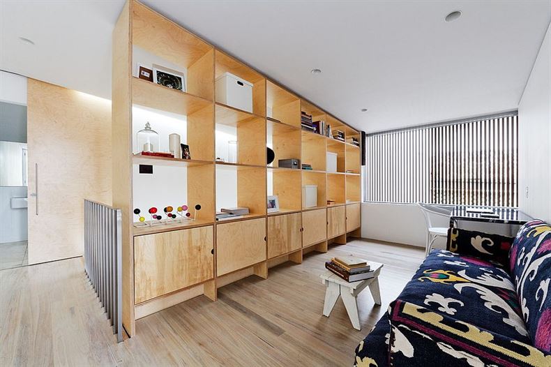 Make-the-most-out-of-your-room-divider-by-using-it-as-a-display-and-storage-unit