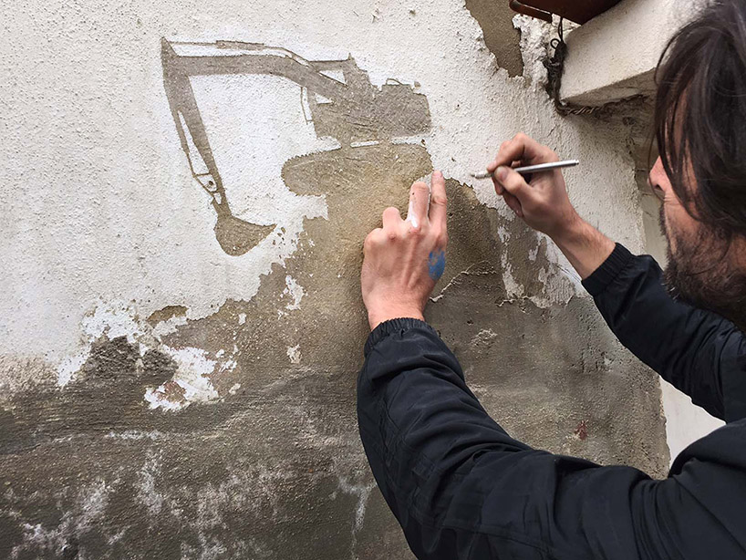 אמן רחוב מקלף קירות מחנה פליטים פלסטיני לנופים מעוררים