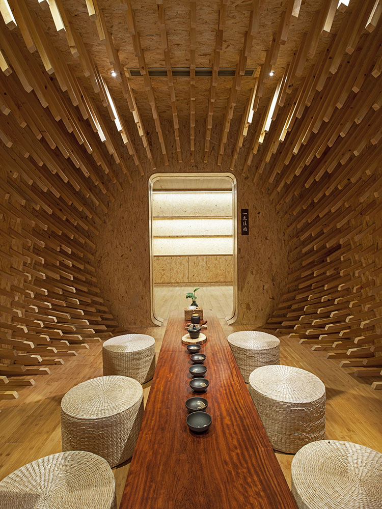 999-wooden-sticks-creates-a-beautiful-optical-illusion-inside-this-chinese-teahouse-by-minax-4