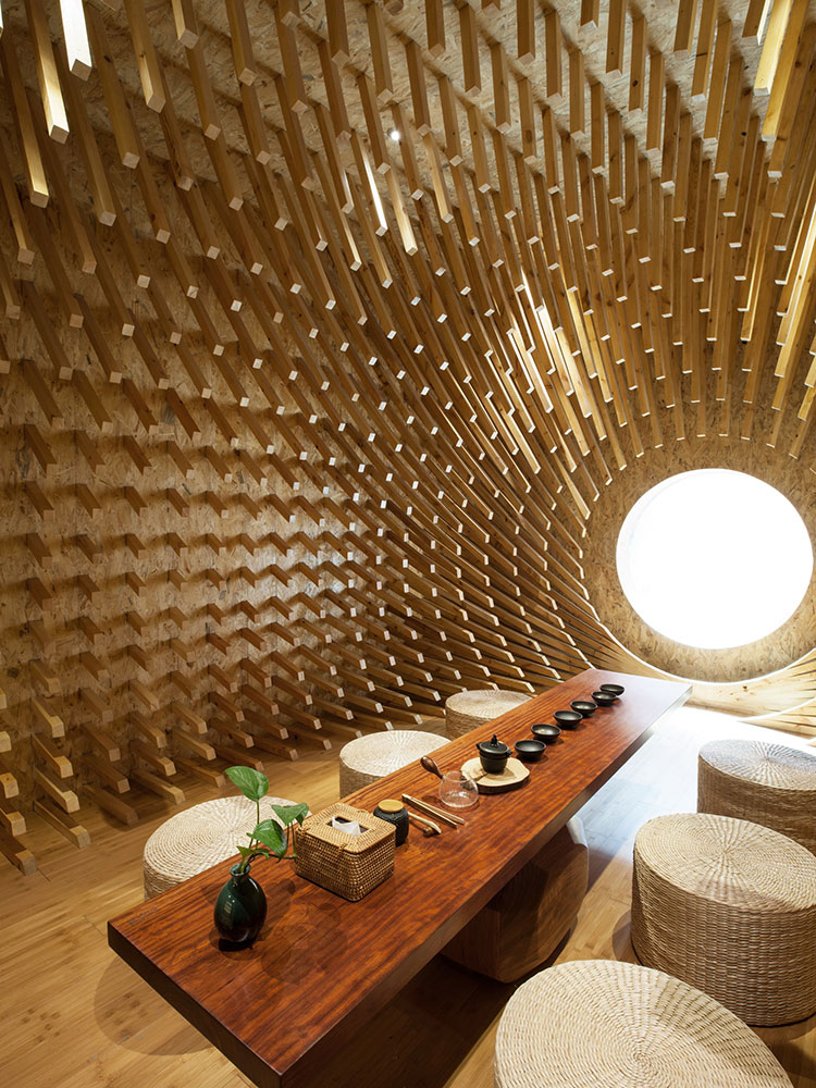 999-wooden-sticks-creates-a-beautiful-optical-illusion-inside-this-chinese-teahouse-by-minax-7