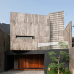 בית בטון עכשווי בעיצוב גיאומטרי ואדריכלות מינימליסטית