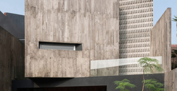 בית בטון עכשווי בעיצוב גיאומטרי ואדריכלות מינימליסטית